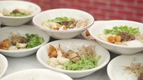 Close up of rows of traditional food plates for buffet party Stock Footage 342229962