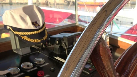 Close up Rudder and a captains cap at wheelhouse Stock Footage 112276336