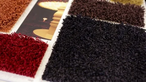 Close up of rug examples in an interior design stor Stock Footage 82076728