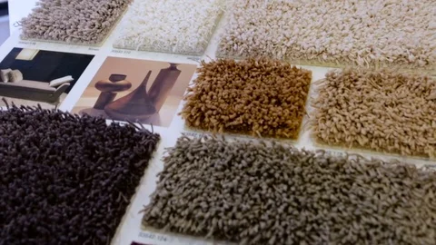 Close up of rug examples in an interior design stor Stock Footage 82076742