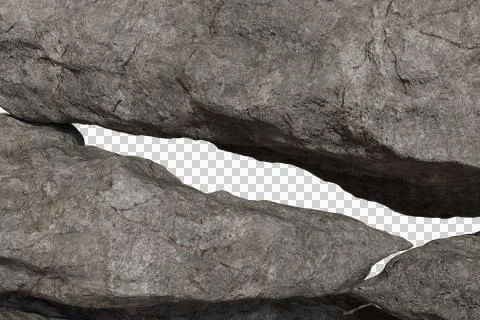 Close-up of rugged, grey rock surface with a deep, dark fissure running Stock Photos