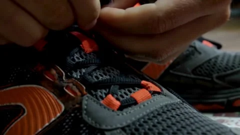 Close up of runner getting ready tying running shoes before Jogging and Wor.. Video stock 265938946