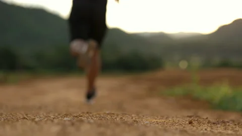 Close up runner's foot start to running at sunset. The athlete sprinting. Stock-Footage 158886837