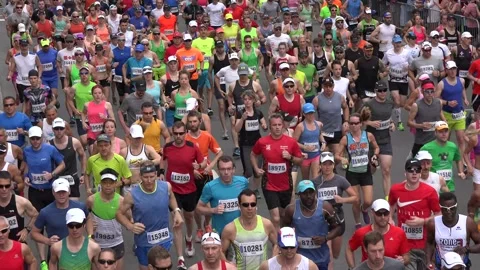 Close up of runners in a marathon Stock-Footage 139976704