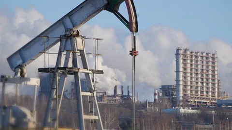 Close-up of a running pump for the extraction of crude oil and of a Stock Footage 86945358