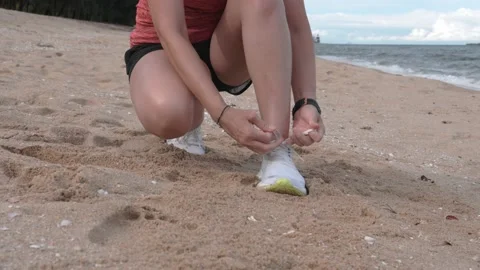 Close up of running shoes getting ready tying running shoes before jogging Stock Footage 219458955