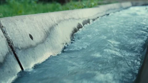 Close up of rush water inside a concrete channel Stock Footage 341128962