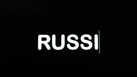 Close up of RUSSIA being typed into computer monitor screen with blinking 스톡 동영상 259324825