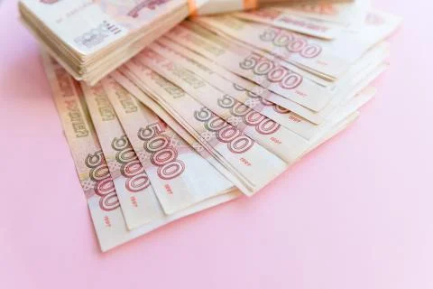 Close-up of russian banknotes. Five Thousand Ruble Notes on pink background Stock Photos