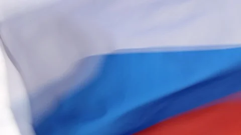 Close up of Russian flag blowing in slow motion Stock Footage 90894343