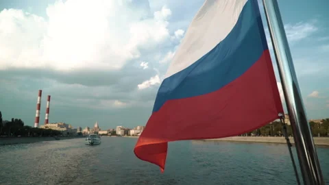 Close up Russian flag waving in the background of the cityscape, slowmotion Stock Footage 212389291
