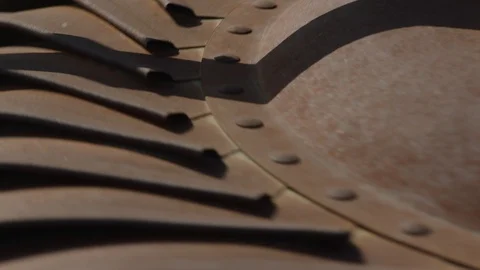 Up close of a rusted air vent spinning 1 Stock Footage 106586616