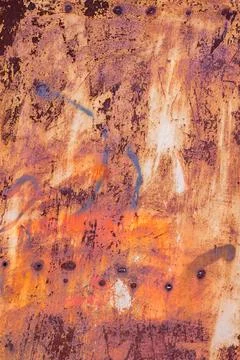 Close-Up of Rusted Metal Surface with Abstract Spray Paint Stock Photos
