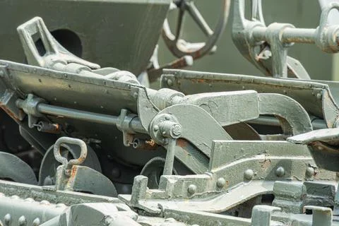 Close-up of a rusted metallic mechanical device, predominantly gray and wea.. Stock Photos