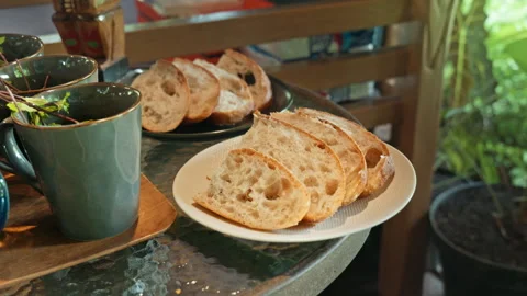 Close up of rustic bread loaf on table i Stock Footage 341228667
