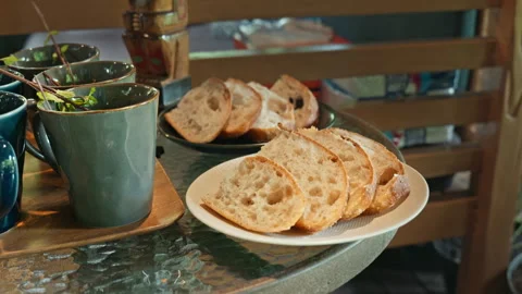 Close up of rustic bread loaf on table i Stock Footage 341228710