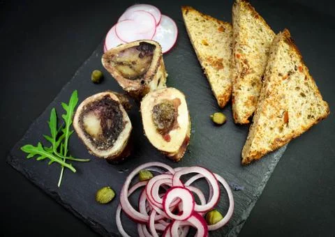 Close up of rustic english bone marrow toast Stock Photos
