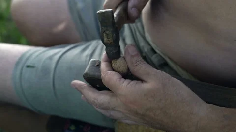 Close-up, Rustic Male Colitis Nuts Hammered on the Arm of the Old Chair Stock Footage 88197392