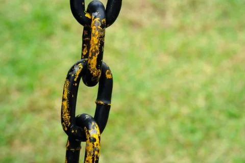 Close up of rustic old chain with blurred background Stock Photos