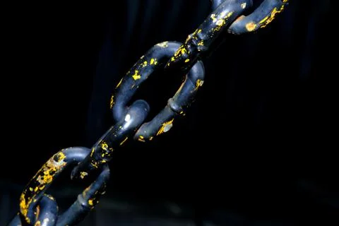 Close up of rustic old chain with dark background Foto stock