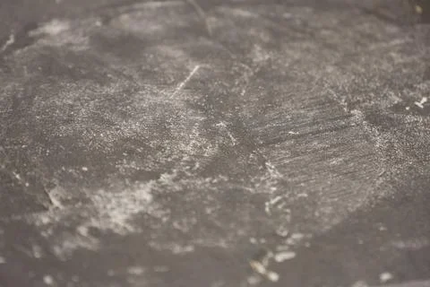 Close-up of a rustic surface showcasing an abstract pattern of dust and scrat Stock Photos