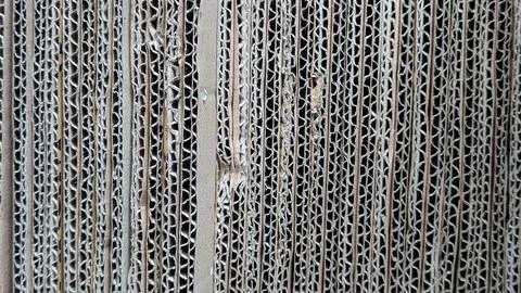Close-up of a rustic woven bamboo mat with a traditional checkered pattern... Stock Photos
