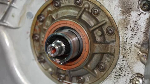 Close-up of rusty automotive engine component with bolted assembly Stock Footage 347301978