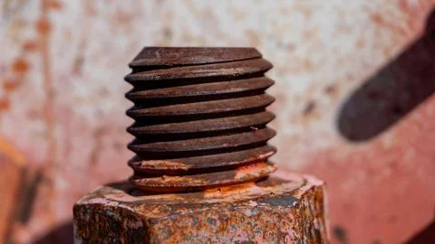Close-up of a rusty bolt with corroded threads Stock Photos