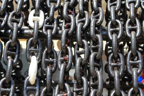A close up of a rusty chain . Stock Photos
