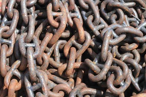 A close up of a rusty chain . Stock Photos