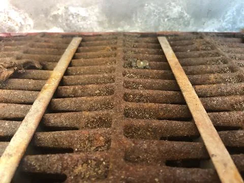 A close up of a rusty grill as an abstract background. Stock Photos