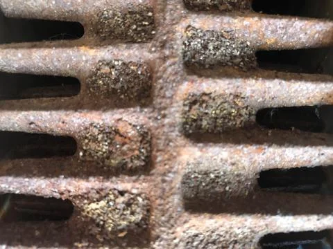 Close up of a rusty grill, abstract. Stock Photos