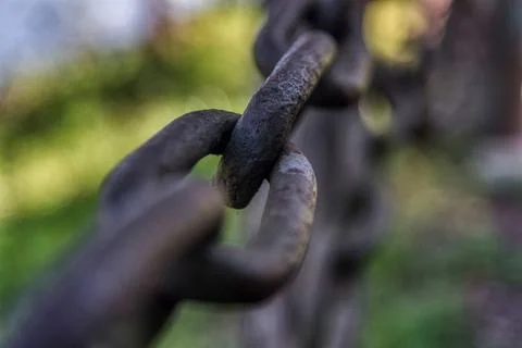 Close up a rusty iron chain or the interlocking steel rings Stock Photos