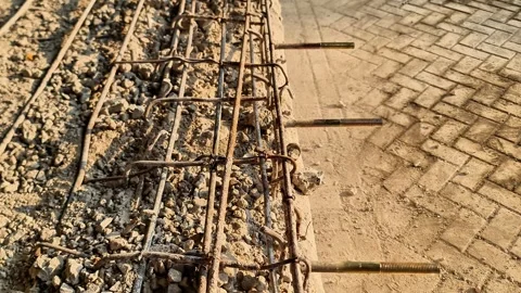 Close Up of Rusty Iron Reinforcement Grid and Crushed Stone Base Before Concrete Stock Footage 347111226
