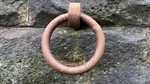 Close up of a rusty iron ring used to moor barges on a canal Vidéo 291390356