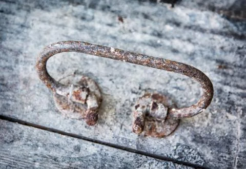 Close up of rusty knocker door Stock Photos
