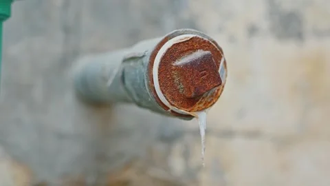 Close Up of Rusty Leaking Metal Pipe with Corrosion Damage Stock Footage 337189815
