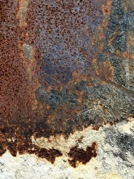 Close-up of rusty metal surface with peeling paint Stock Photos
