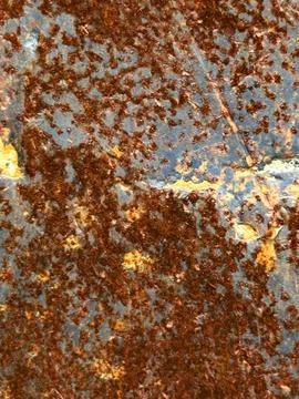 Close-up of rusty metal surface with peeling paint Stock Photos