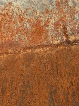 Close-up of rusty metal surface with peeling paint Stock Photos