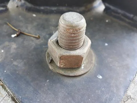 Close up of a rusty metallic bolt Stock Photos