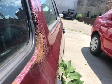 Close up of an rusty old car. Stock Photos