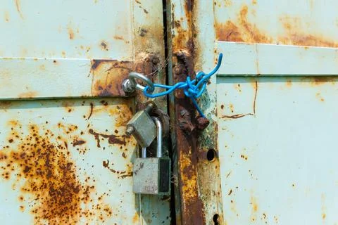 Close-Up of Rusty Padlocks On An Old Metal Door Stock Photos