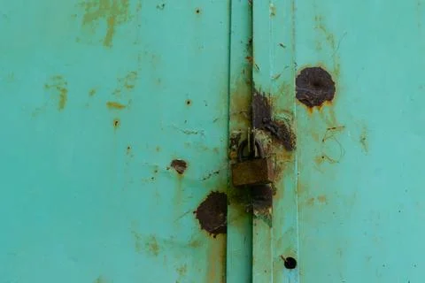 Close-Up of Rusty Padlocks On An Old Metal Door Stock Photos