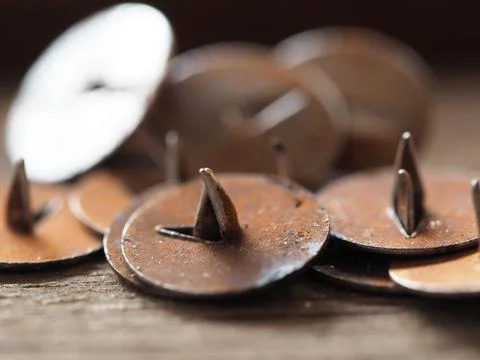 Close-up of rusty push pins. selective focus Stock Photos