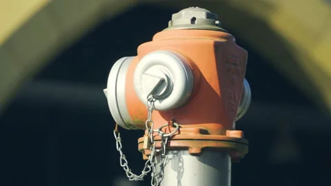Close up, rusty red fire hydrant at sunny day. Stock Footage 144797352