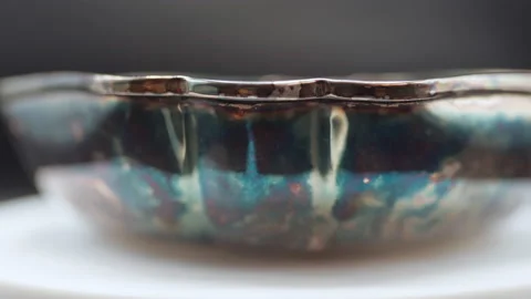 Close-up of rusty silver bowl as an object of flatware decoration, vintage plate Stock Footage 147218307