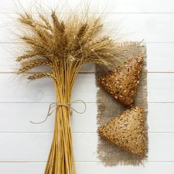 Close up rye multigrain bread on wood white baackground Stock Photos