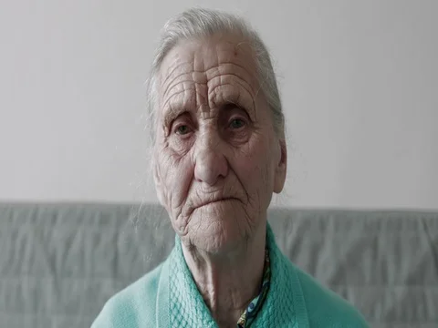 Close-up sad old woman portrait . Stock Footage