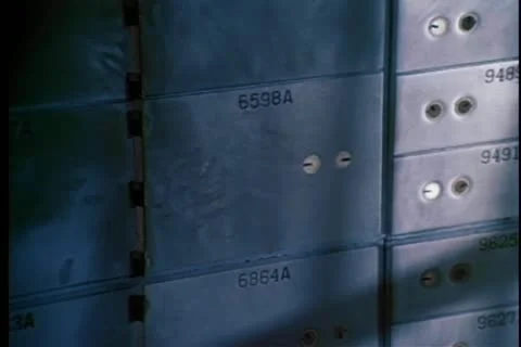 Close-up of safe deposit boxes in a bank vault Stock Footage 25207802